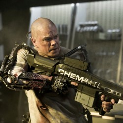 First Image from Neill Blomkamp’s ELYSIUM Shows Matt Damon Locked and Loaded