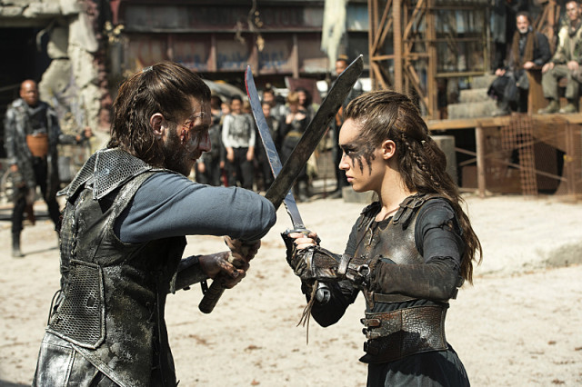 The 100 -- "Watch The Thrones" -- ImageÃÂ HU304a_0123 -- Pictured (L-R): Zachary McGowan as Roan and Alycia Debnam-Carey as Lexa -- Credit: Cate Cameron/The CW -- ÃÂ© 2016 The CW Network, LLC. All Rights Reserved